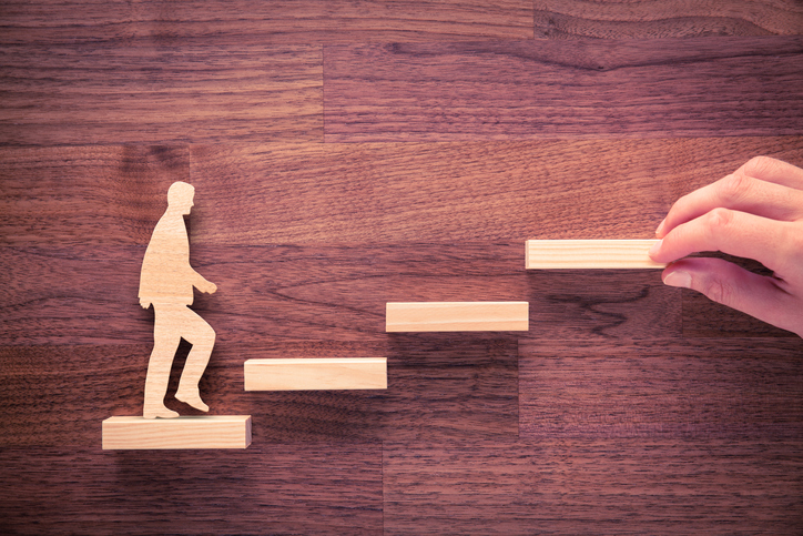 Personal development career Personal development, personal and career growth, progress and potential concepts. Coach (human resources officer, manager, mentor) motivate employee to growth.